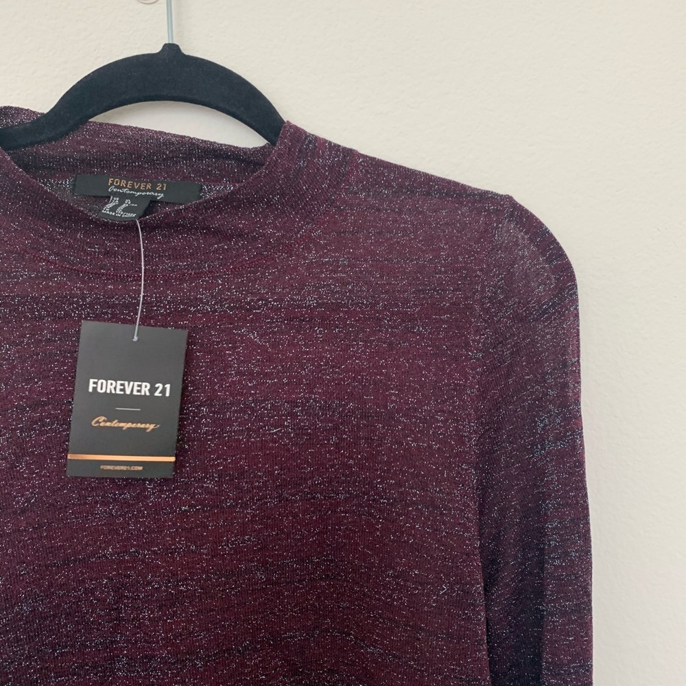 See through mock neck shimmery shirt